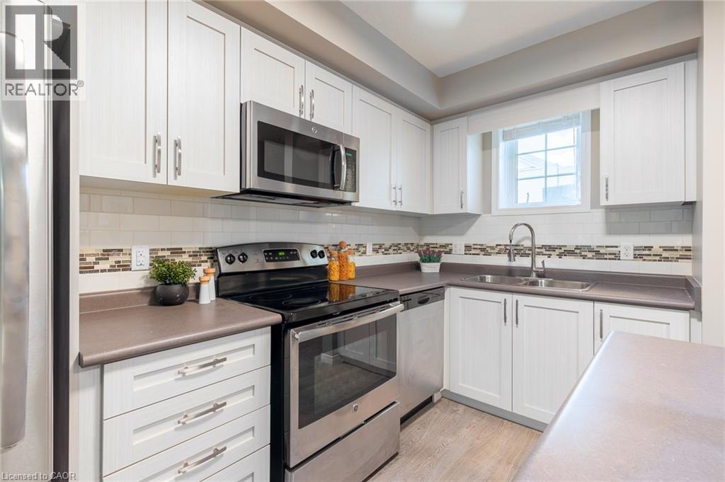 388 Old Huron Road Unit# 23d, Kitchener, Ontario  N2R 0J5 - Photo 4 - 40839184