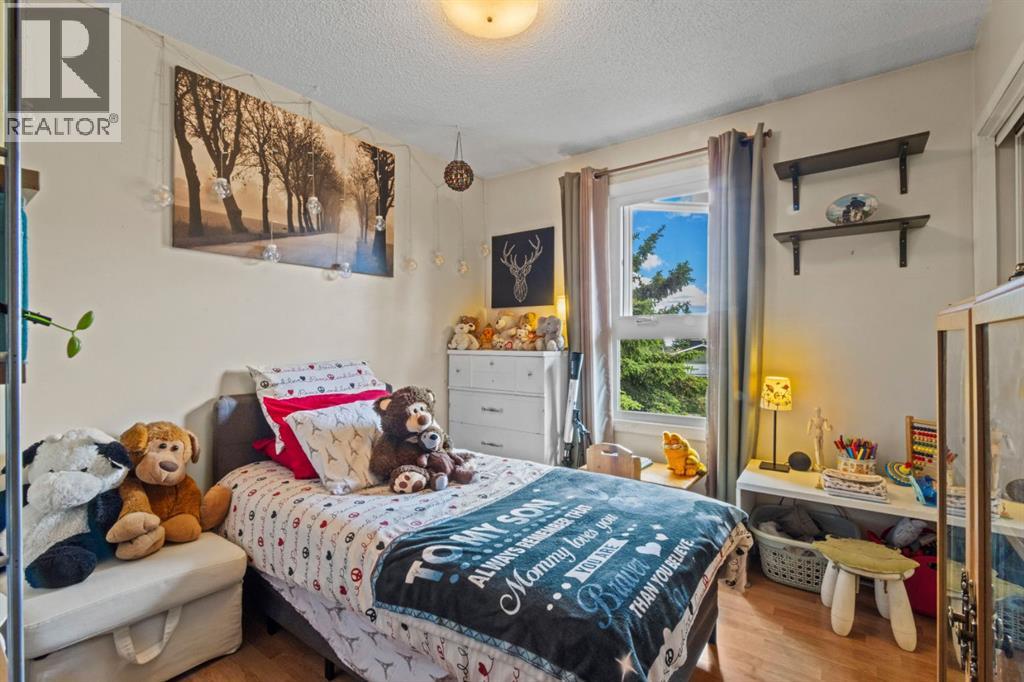 13005 6 Street SW, Calgary, Alberta  T2W 4J8 - Photo 21 - A2320000
