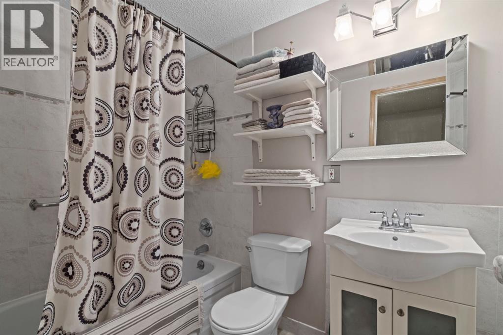 13005 6 Street SW, Calgary, Alberta  T2W 4J8 - Photo 23 - A2320000