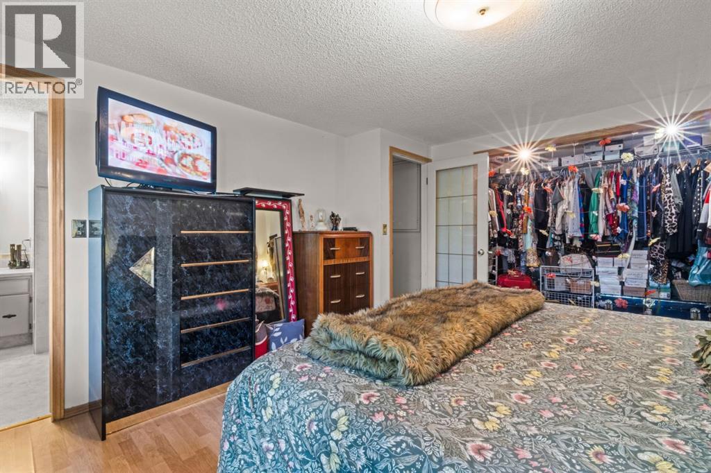 13005 6 Street SW, Calgary, Alberta  T2W 4J8 - Photo 25 - A2320000