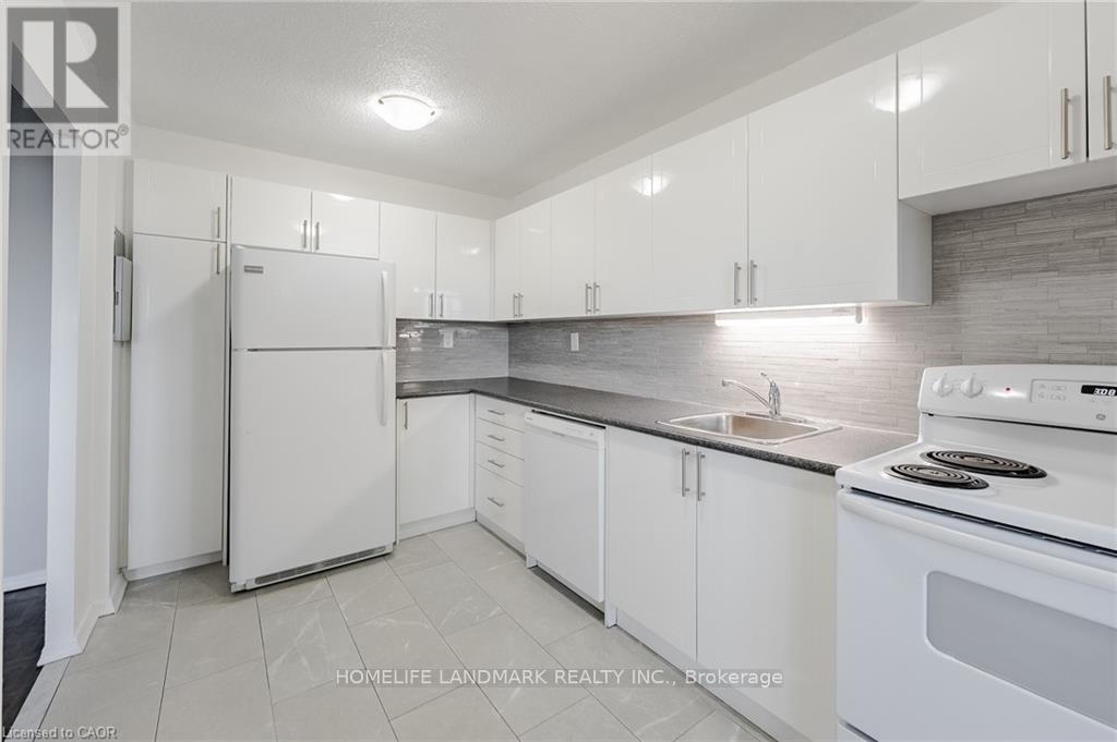 401 - 770 Hager Avenue, Burlington, Ontario  L7S 1X1 - Photo 5 - W12998616