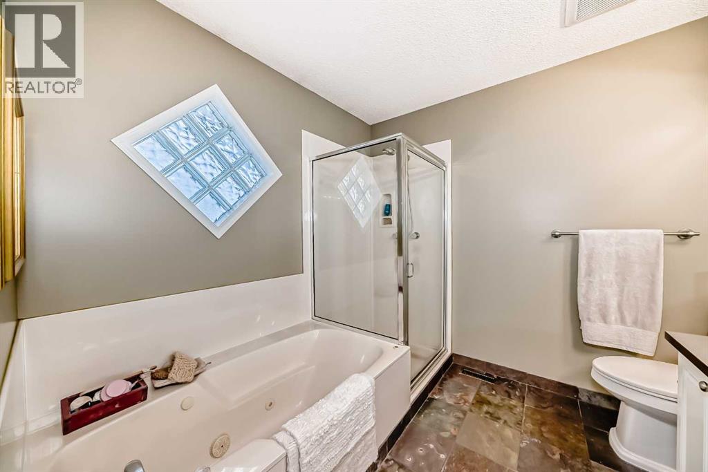 409 Rocky Ridge Bay Nw, Calgary, Alberta  T3G 4H8 - Photo 21 - A2319625