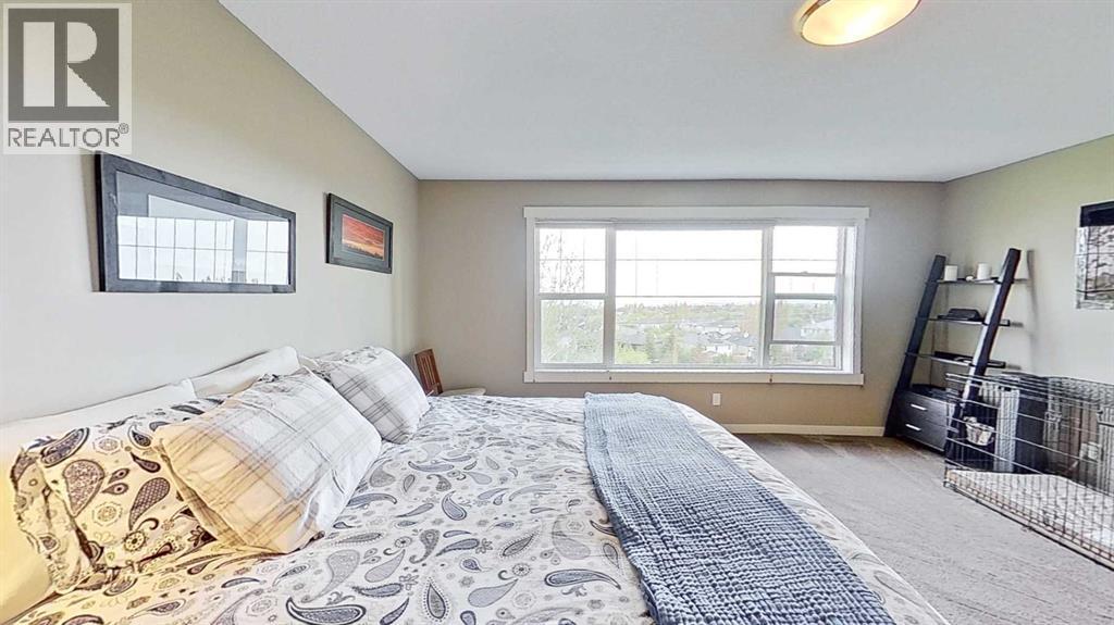 70 Panamount Road NW, Calgary, Alberta  T3K 0H6 - Photo 16 - A2318495
