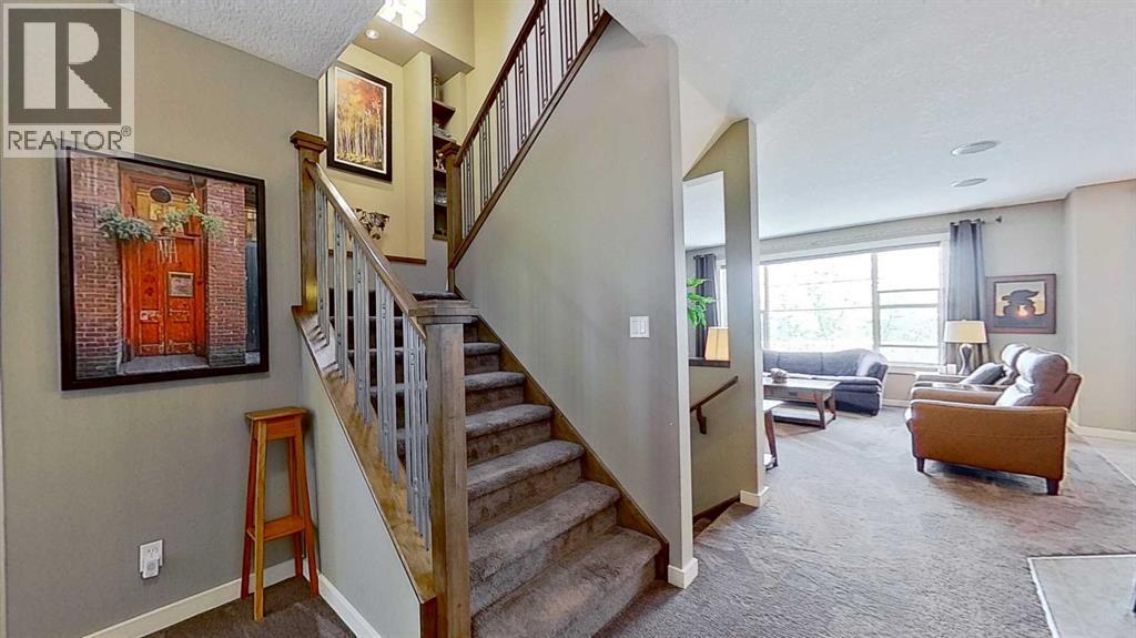 70 Panamount Road NW, Calgary, Alberta  T3K 0H6 - Photo 3 - A2318495