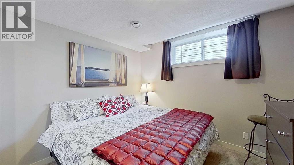 70 Panamount Road NW, Calgary, Alberta  T3K 0H6 - Photo 23 - A2318495