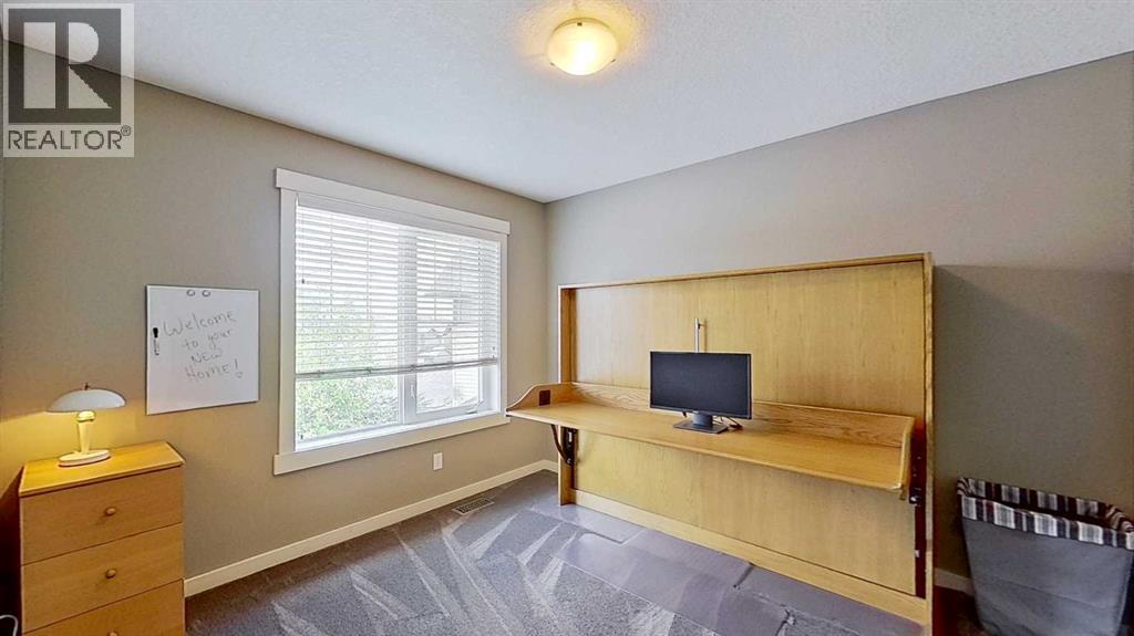 70 Panamount Road NW, Calgary, Alberta  T3K 0H6 - Photo 12 - A2318495