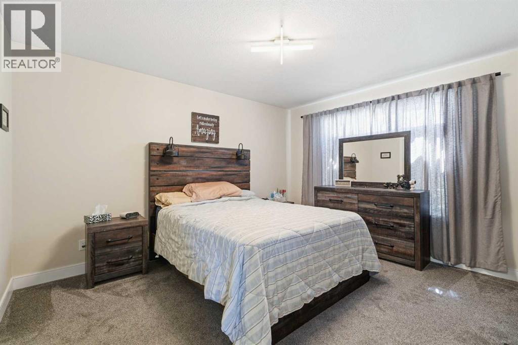 66 Pondside Crescent, Blackfalds, Alberta  T4M 0G3 - Photo 12 - A2319348