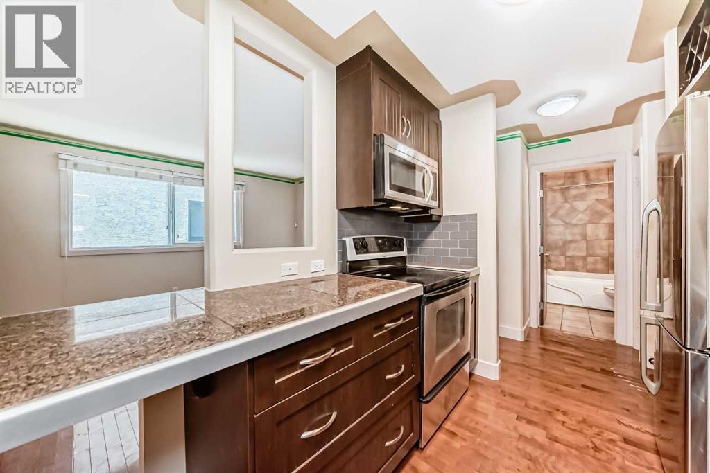 205, 2417 17 Street Sw, Calgary, Alberta T2T 4M9 - Photo 4 - A2318532