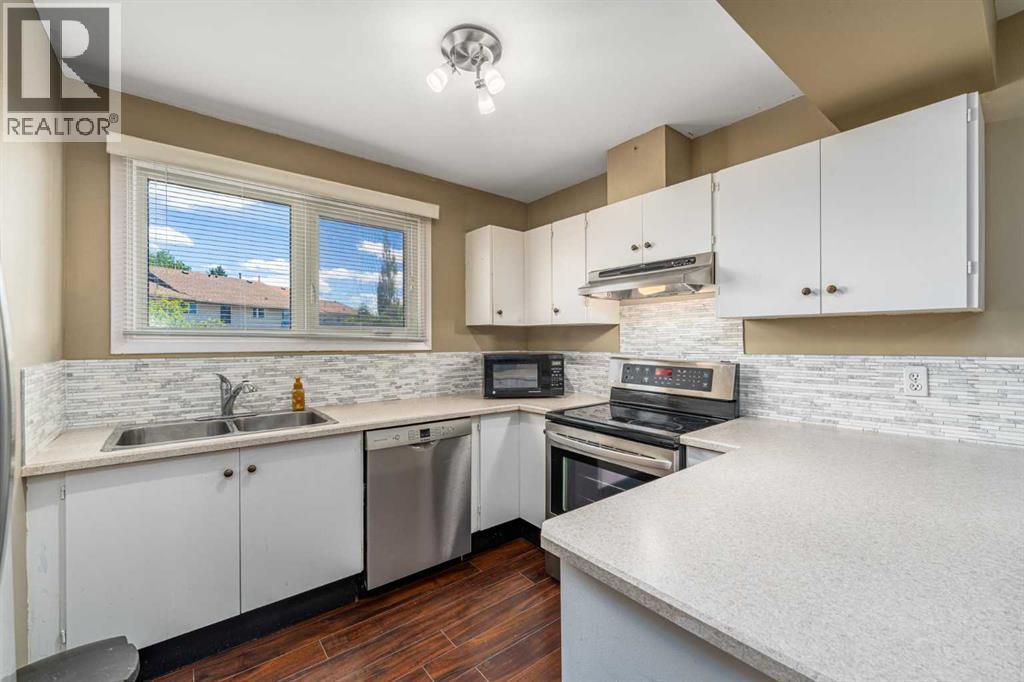 12 Woodhill Road Sw, Calgary, Alberta  T2W 3P2 - Photo 11 - A2320610