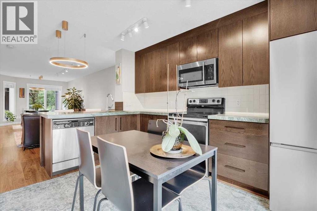 1562 93 Street Sw, Calgary, Alberta  T3H 0P5 - Photo 9 - A2320530