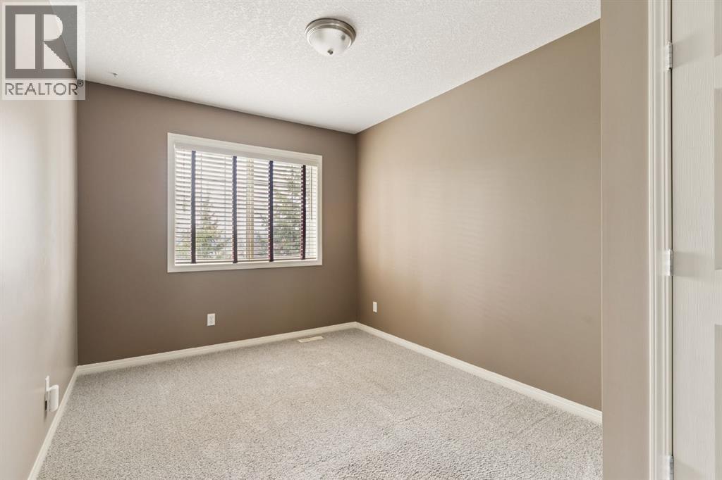 25 Hidden Creek Rise Nw, Calgary, Alberta T3A 6L3 - Photo 18 - A2317734