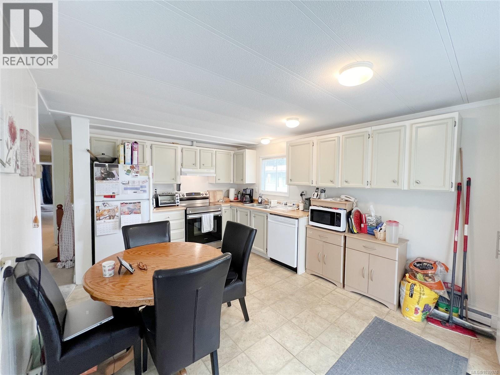 406 Matchlee Dr, Gold River, British Columbia V0R 1G0 - Photo 2 - 1039978