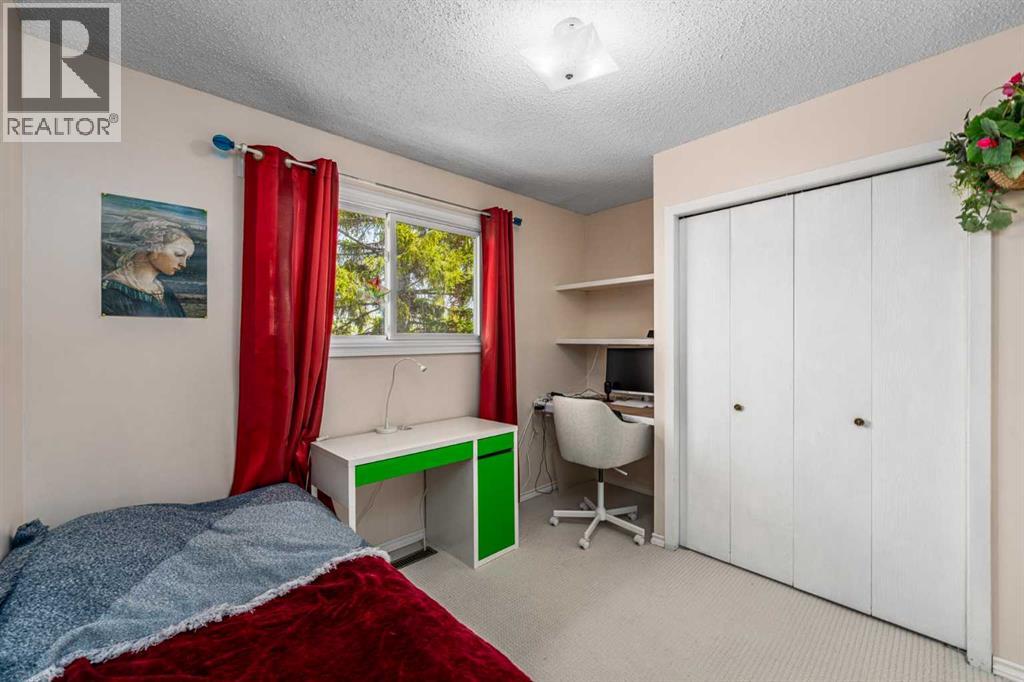 1455 Berkley Drive Nw, Calgary, Alberta  T3K 1T6 - Photo 22 - A2318714