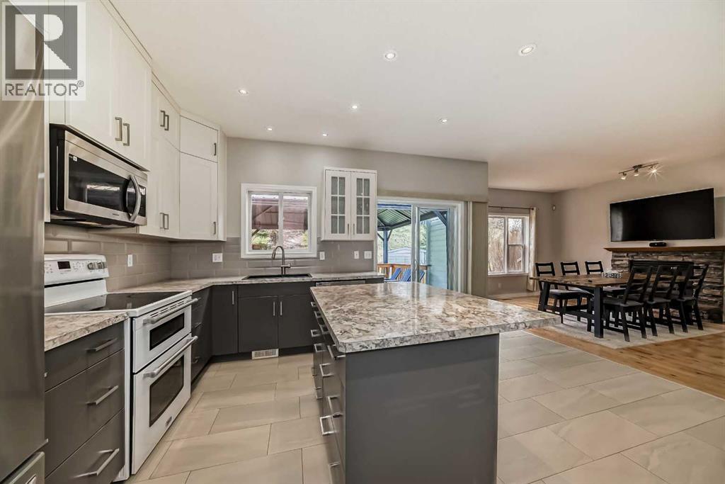 307 Arbour Crest Road NW, Calgary, Alberta  T3G 4J9 - Photo 6 - A2311494