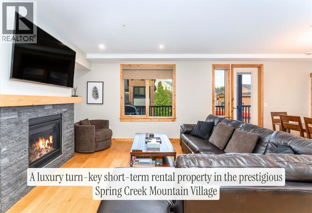 210, 1408 Spring Creek Gate, Canmore, Alberta  T1W 0N5 - Photo 2 - A2315325