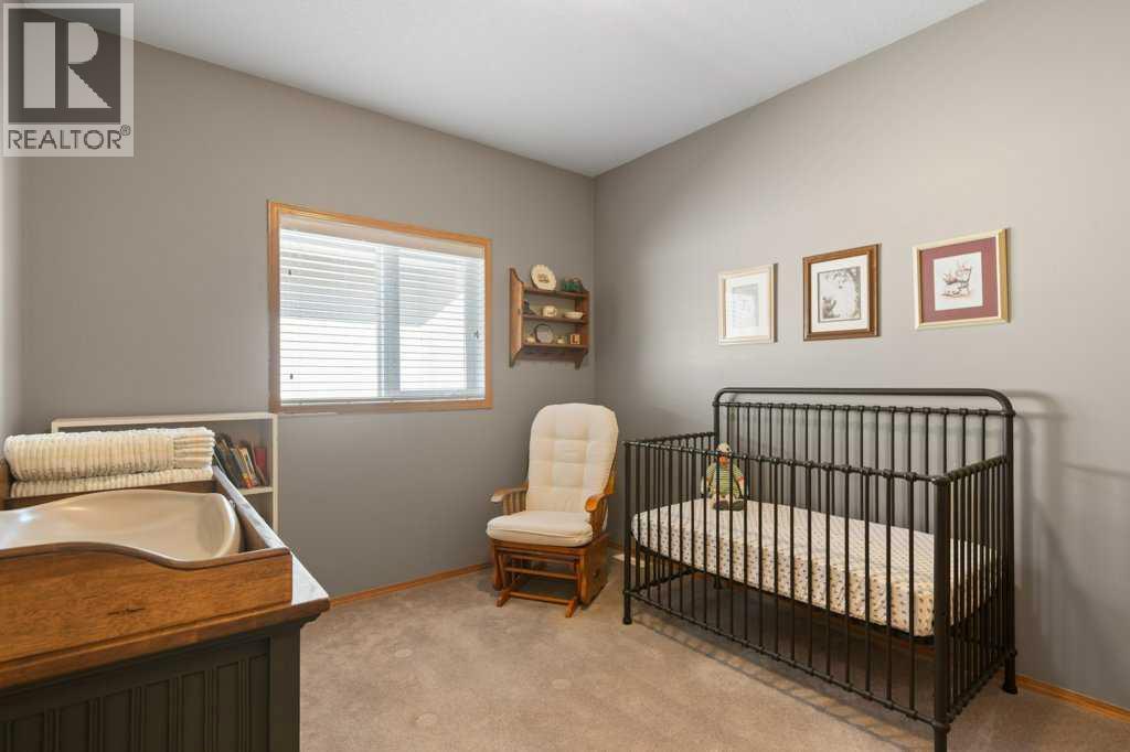 1103 Highland Green View NW, High River, Alberta  T1V 1V8 - Photo 21 - A2319585