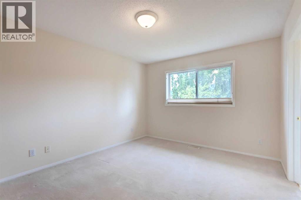 111 Sierra Nevada Way SW, Calgary, Alberta  T3H 3N1 - Photo 18 - A2315899