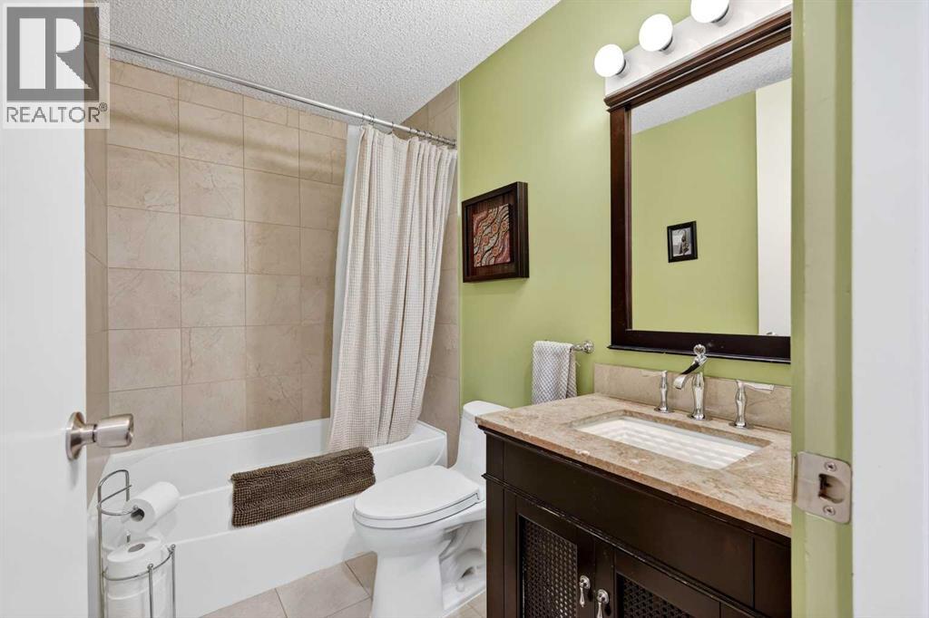 10640 Oakmoor Way Sw, Calgary, Alberta  T2W 2H8 - Photo 23 - A2317861