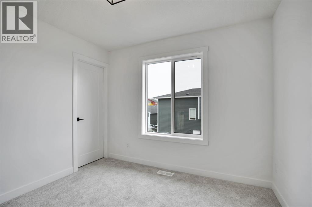 75 Sunvalley Way, Cochrane, Alberta T4C 0X8 - Photo 22 - A2302067