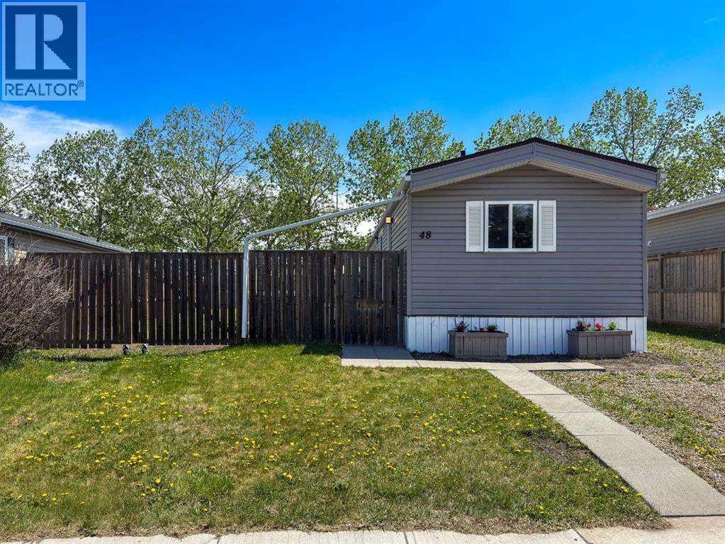 48 Spring Dale Circle SE, Airdrie, Alberta  T4A 1P2 - Photo 1 - A2316810