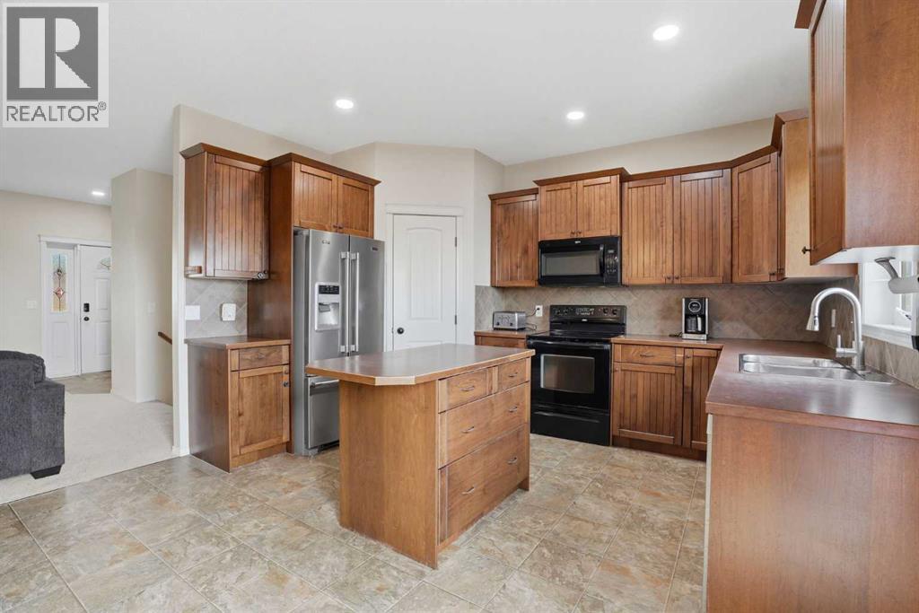 413 Sunrise Hill, Diamond Valley, Alberta  T0L 2A0 - Photo 6 - A2316263