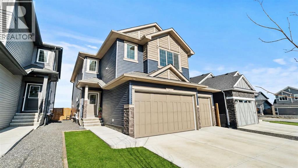 152 Threepoint Cove, Okotoks, Alberta  T1S 5S4 - Photo 1 - A2318231