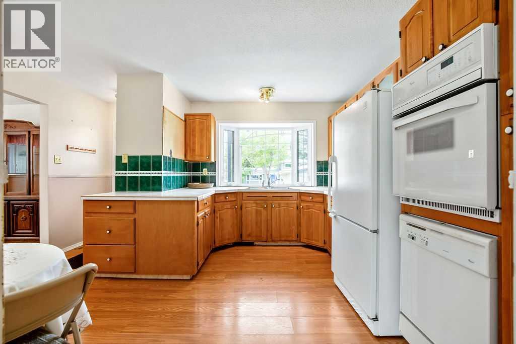 1112 Lake Sylvan Place Se, Calgary, Alberta  T2J 2P6 - Photo 9 - A2320598