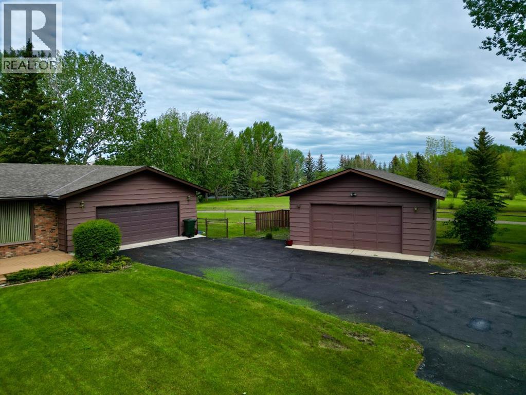 119 Bearspaw Village Crescent, Rural Rocky View County, Alberta  T3L 2P2 - Photo 43 - A2320104