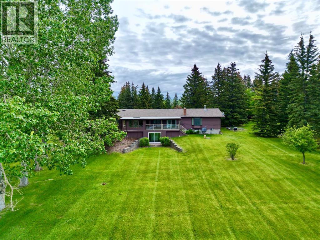 119 Bearspaw Village Crescent, Rural Rocky View County, Alberta  T3L 2P2 - Photo 8 - A2320104