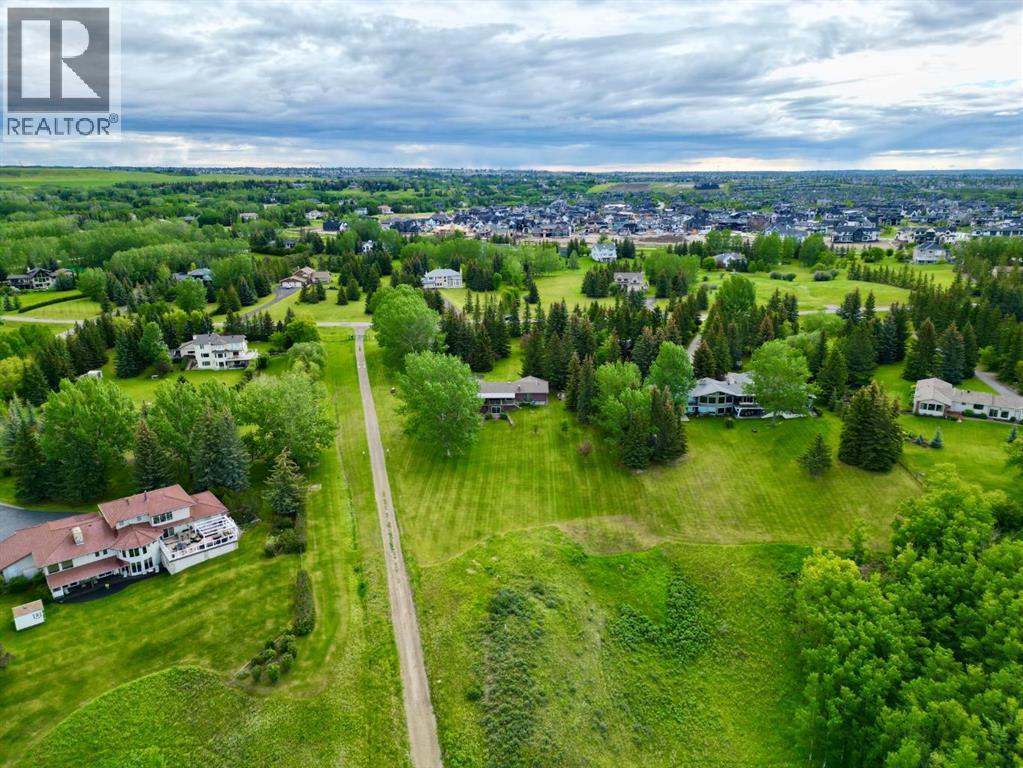119 Bearspaw Village Crescent, Rural Rocky View County, Alberta  T3L 2P2 - Photo 10 - A2320104