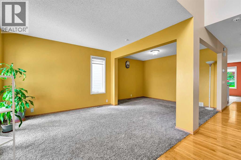 332 Harvest Hills Drive Ne, Calgary, Alberta  T3K 4H7 - Photo 4 - A2288215