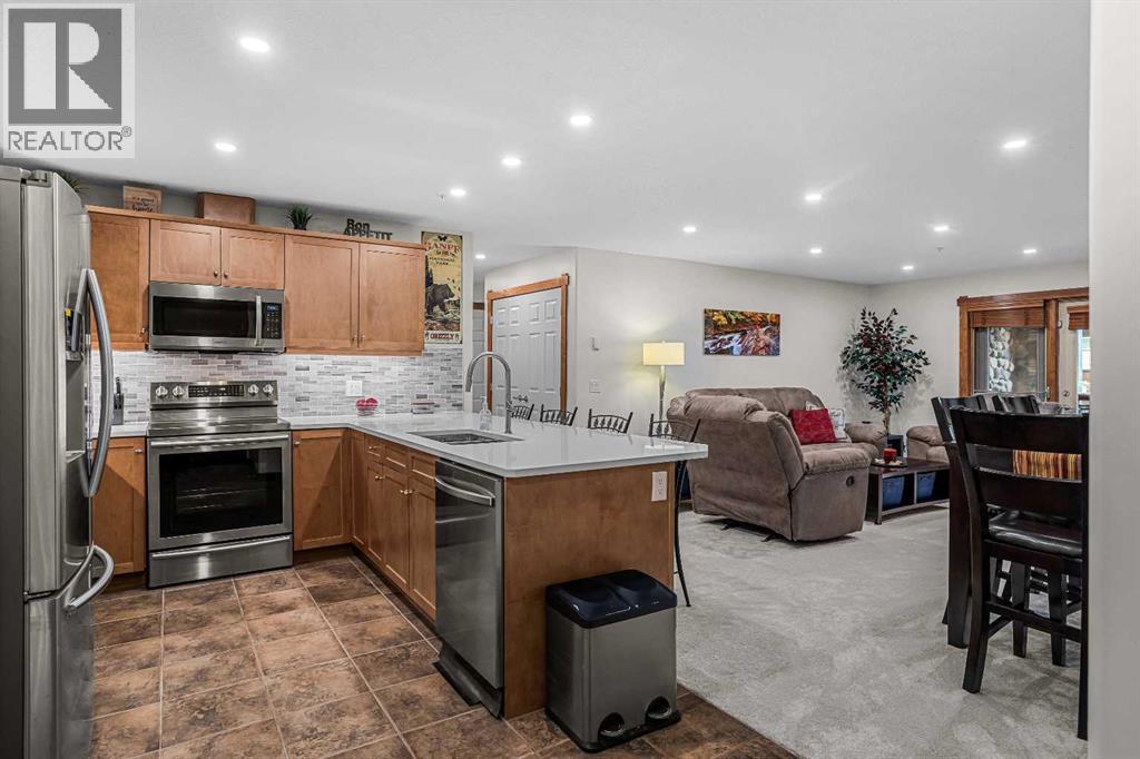205, 170 Crossbow Place, Canmore, Alberta  T1W 3H4 - Photo 2 - A2318058