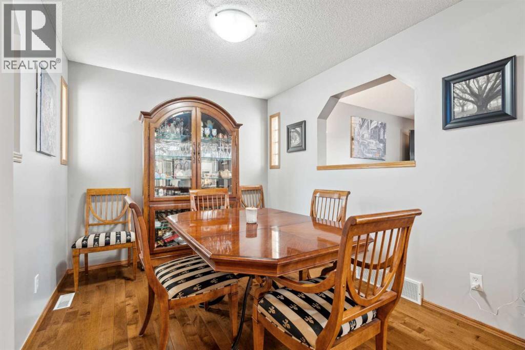25 Harvest Park Court NE, Calgary, Alberta  T3K 4H9 - Photo 5 - A2289187