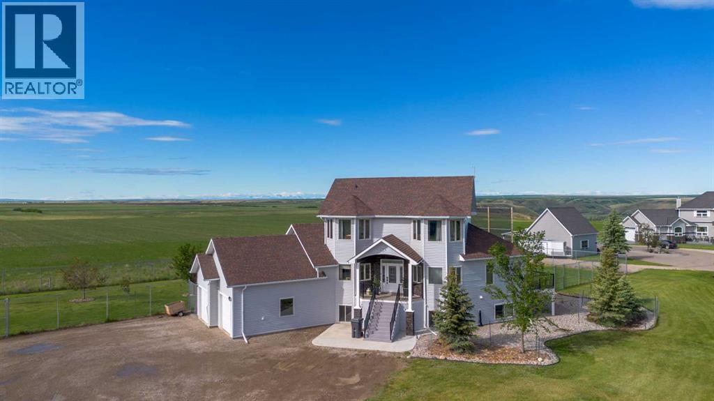 406 Meadow Lark Drive, Rural Lethbridge County, Alberta  T1J 4R9 - Photo 1 - A2304348