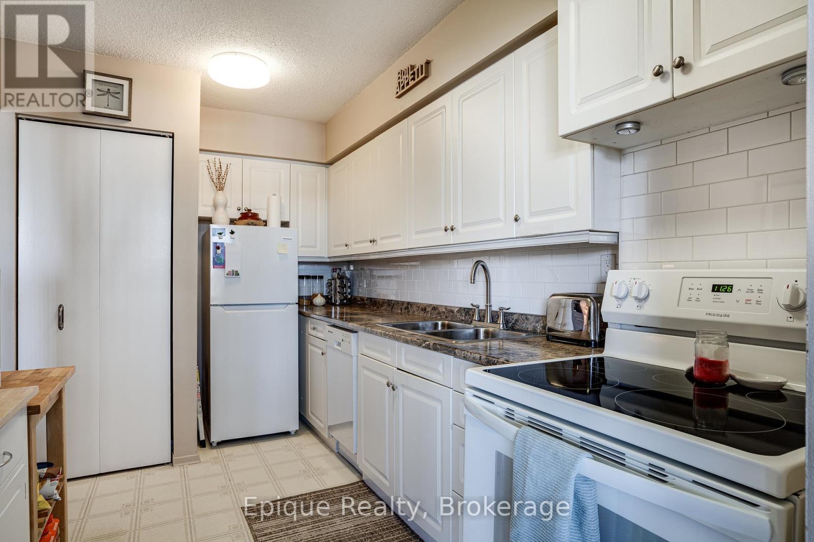 409 - 2055 Upper Middle Road, Burlington, Ontario  L7P 3P4 - Photo 5 - W12765824
