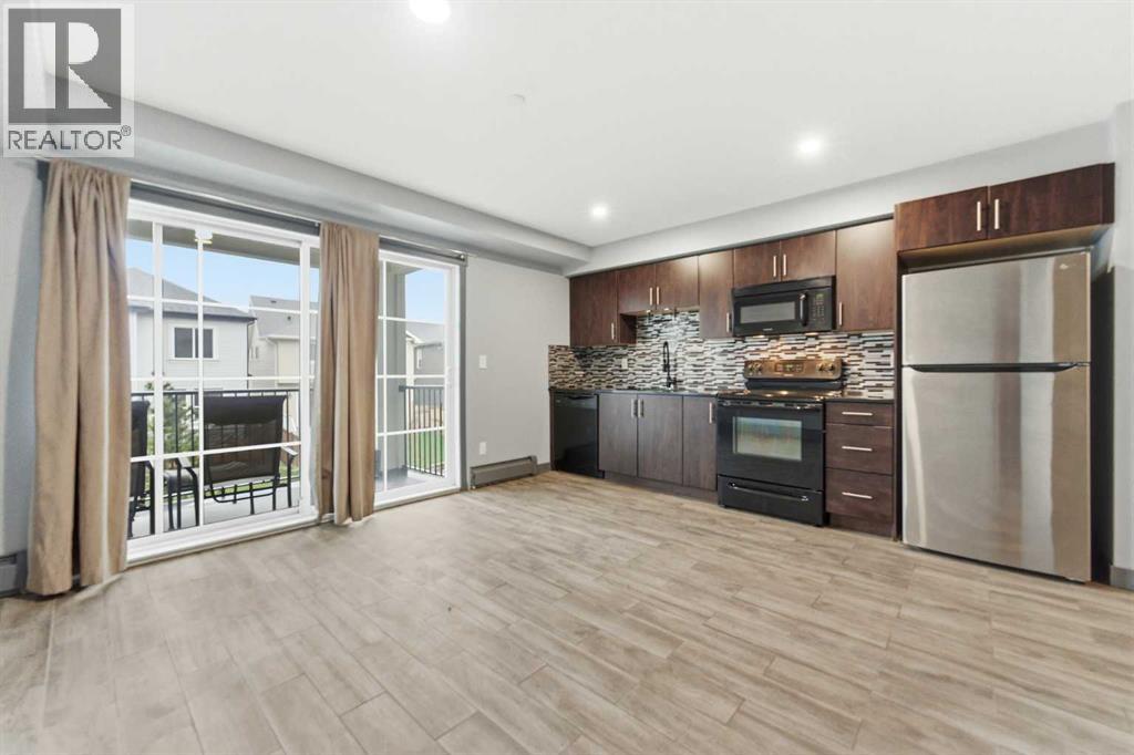 1204, 755 Copperpond Boulevard Se, Calgary, Alberta  T2Z 4R2 - Photo 4 - A2316687