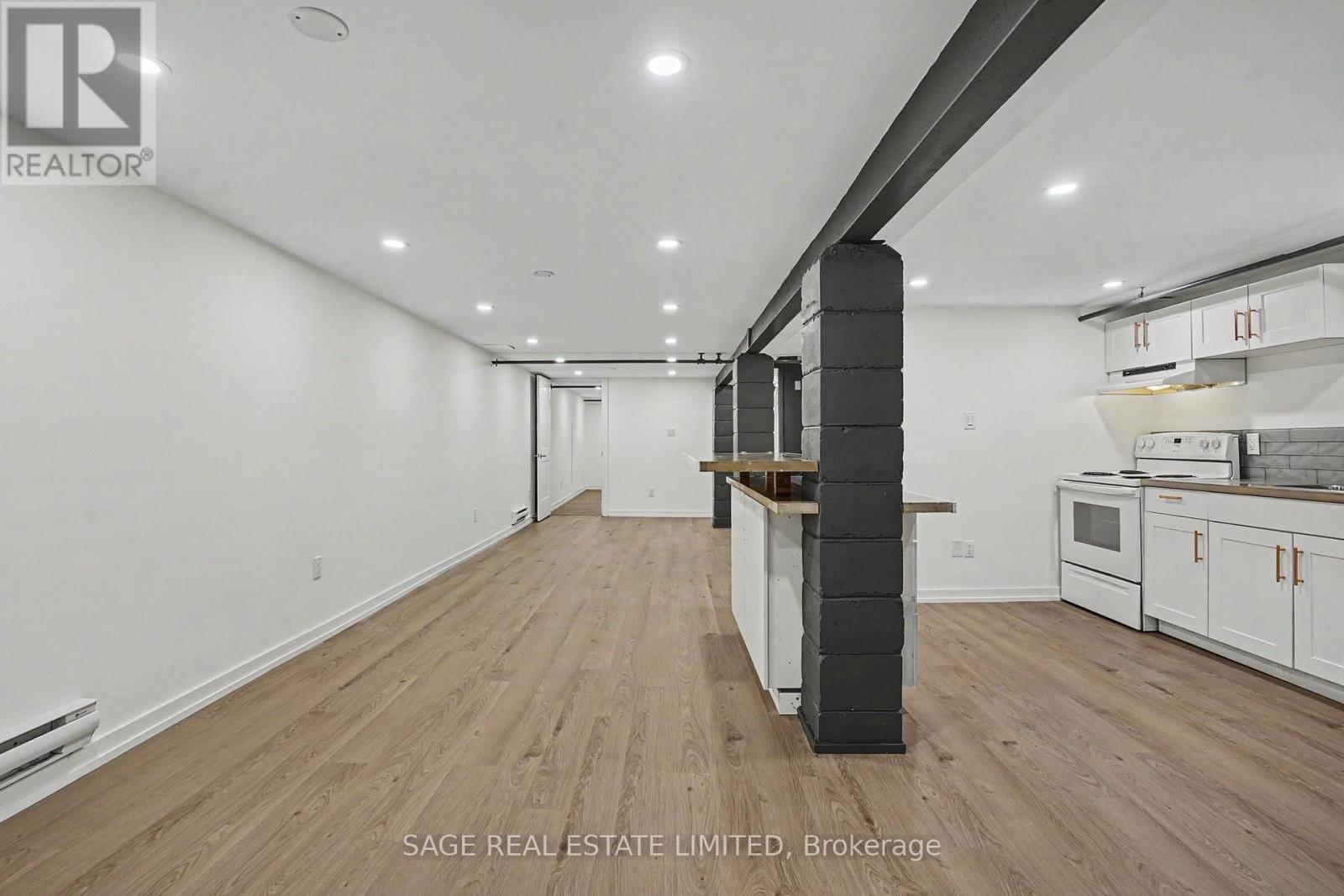 5 - 10 Fir Avenue, Toronto, Ontario  M4E 1B5 - Photo 6 - E13441648