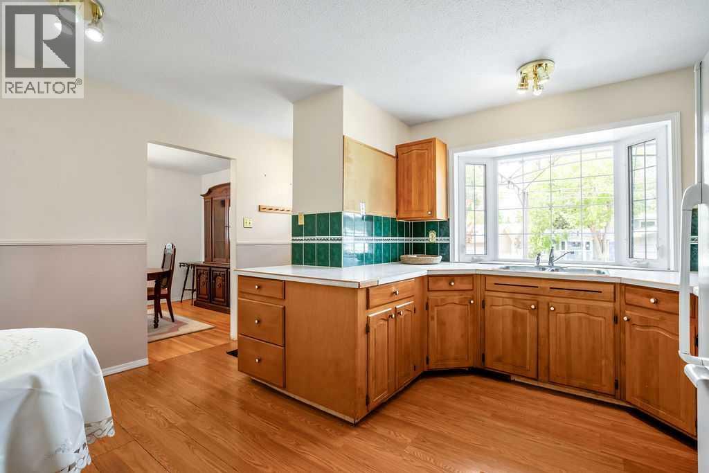 1112 Lake Sylvan Place SE, Calgary, Alberta  T2J 2P6 - Photo 11 - A2320598
