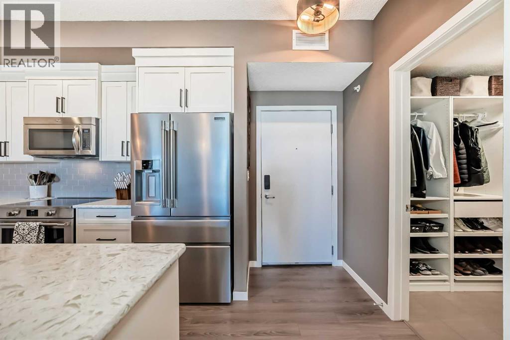 411, 6703 New Brighton Avenue Se, Calgary, Alberta  T2Z 5C8 - Photo 2 - A2320417
