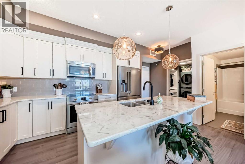411, 6703 New Brighton Avenue Se, Calgary, Alberta  T2Z 5C8 - Photo 3 - A2320417