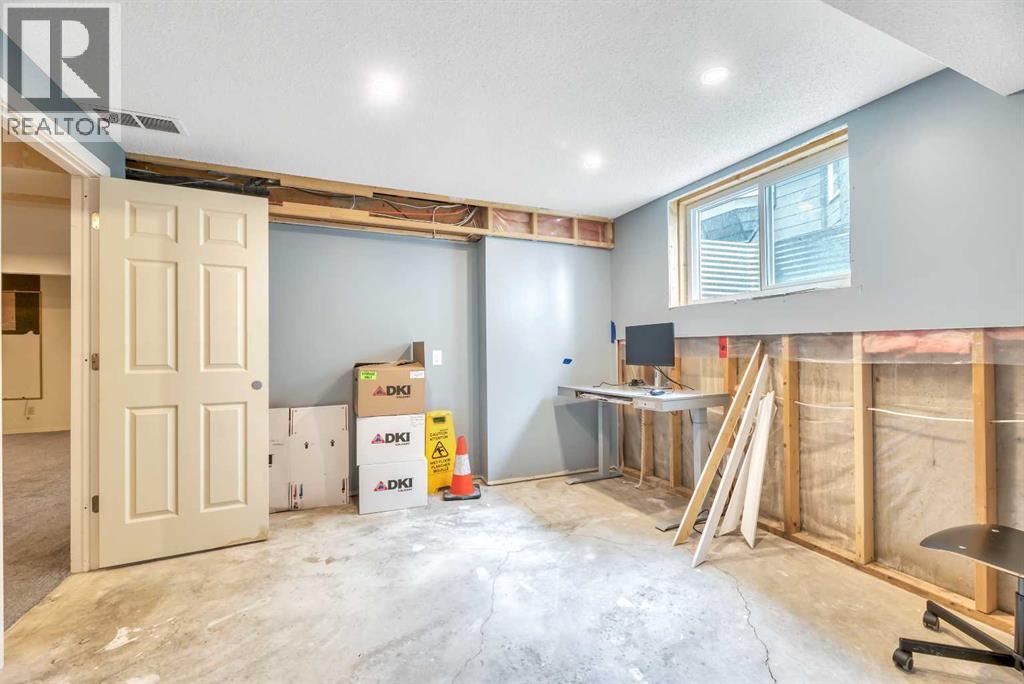 52 Woodpath Terrace Sw, Calgary, Alberta  T2W 5Z7 - Photo 45 - A2319891