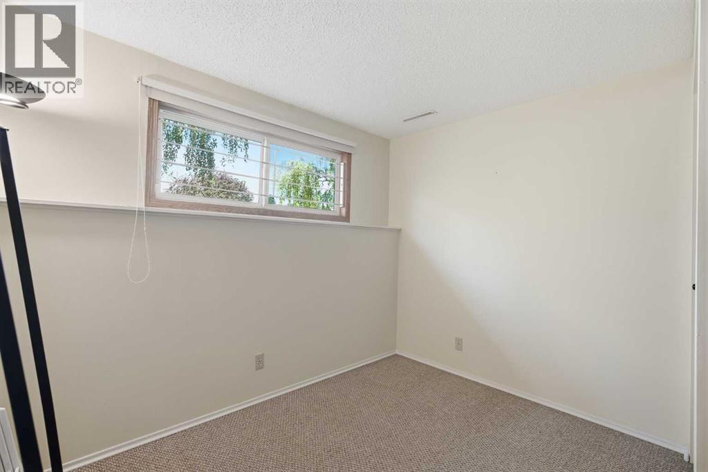 10011 Maplecreek Drive Se, Calgary, Alberta  T2J 1T7 - Photo 31 - A2318196