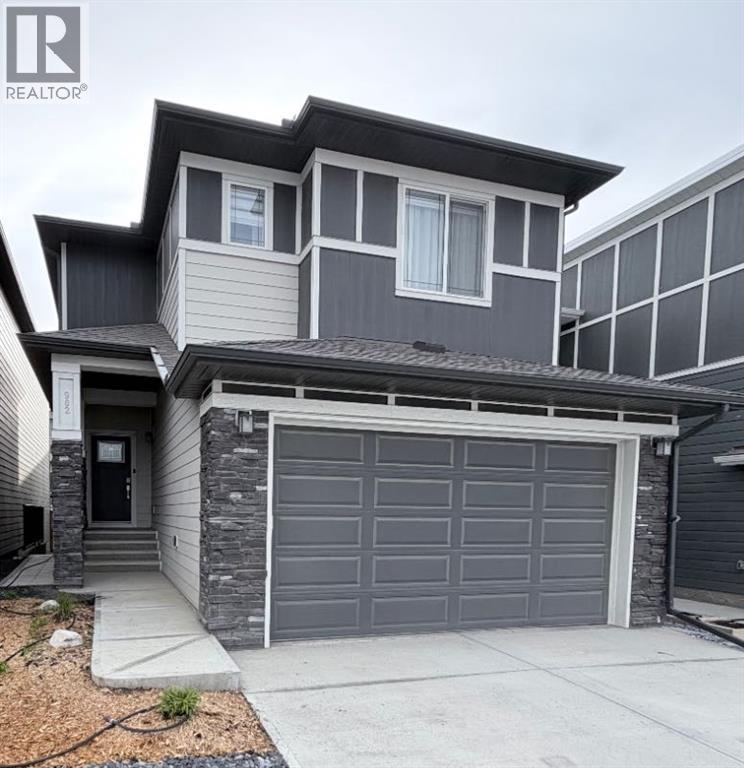 902 Bluerock Way Sw, Calgary, Alberta  T2Y 0S5 - Photo 1 - A2304430