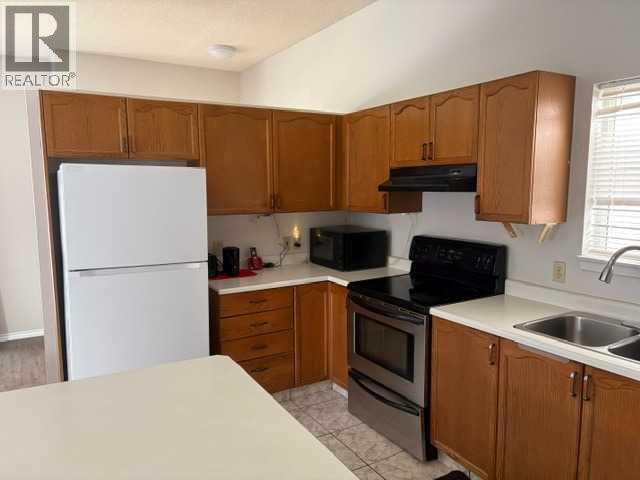 6934 Laguna Way Ne, Calgary, Alberta  T1Y 6W2 - Photo 2 - A2320961