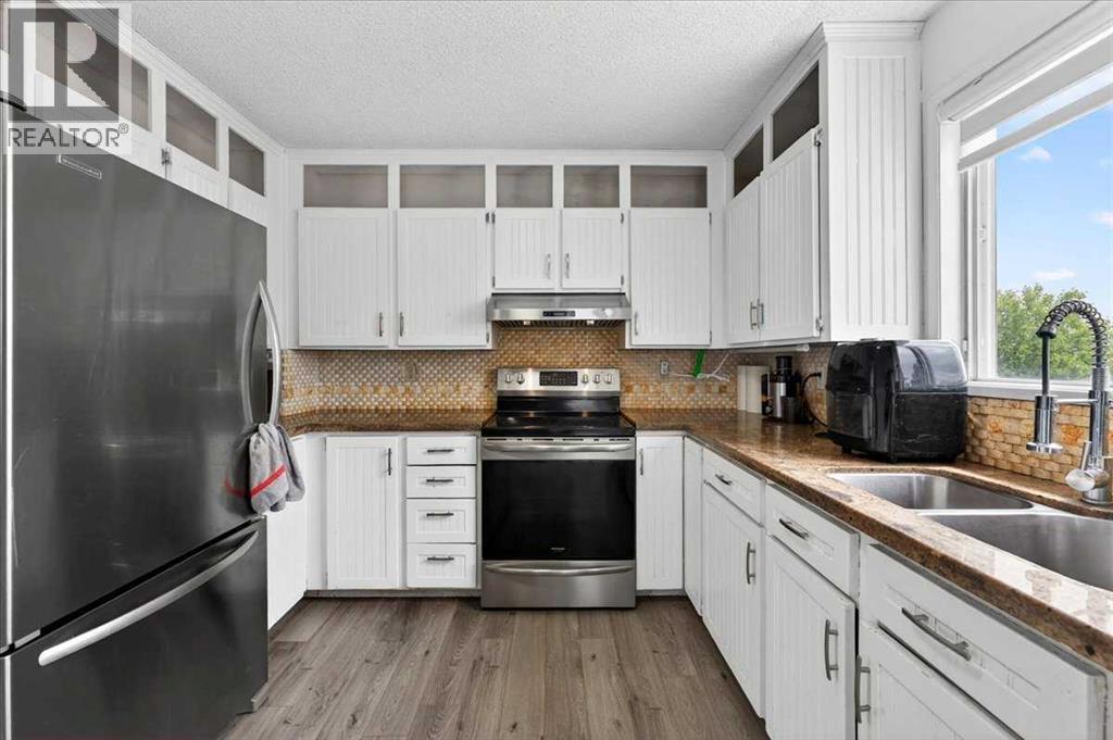 6979 Laguna Way NE, Calgary, Alberta  T1Y 6W5 - Photo 14 - A2316513