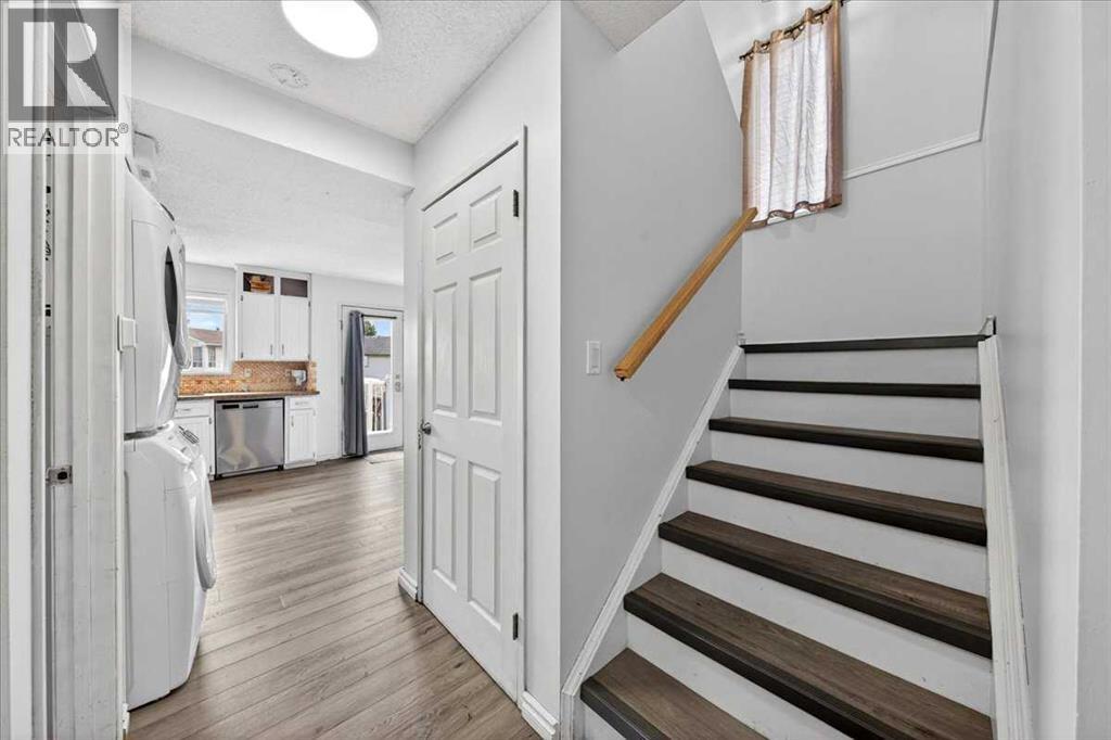6979 Laguna Way NE, Calgary, Alberta  T1Y 6W5 - Photo 9 - A2316513
