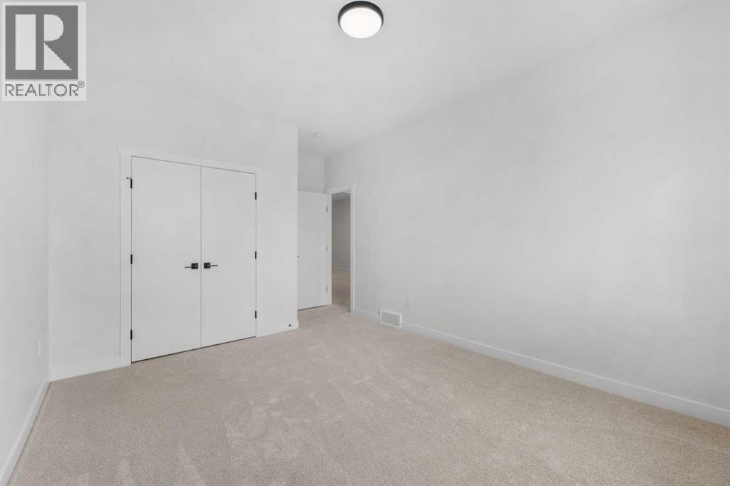 19 Wolf Crescent, Okotoks, Alberta  T1S 5V1 - Photo 28 - A2309942