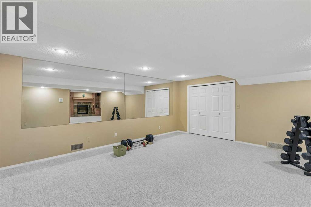 65 Woodpath Terrace Sw, Calgary, Alberta  T2W 5Z5 - Photo 38 - A2320982
