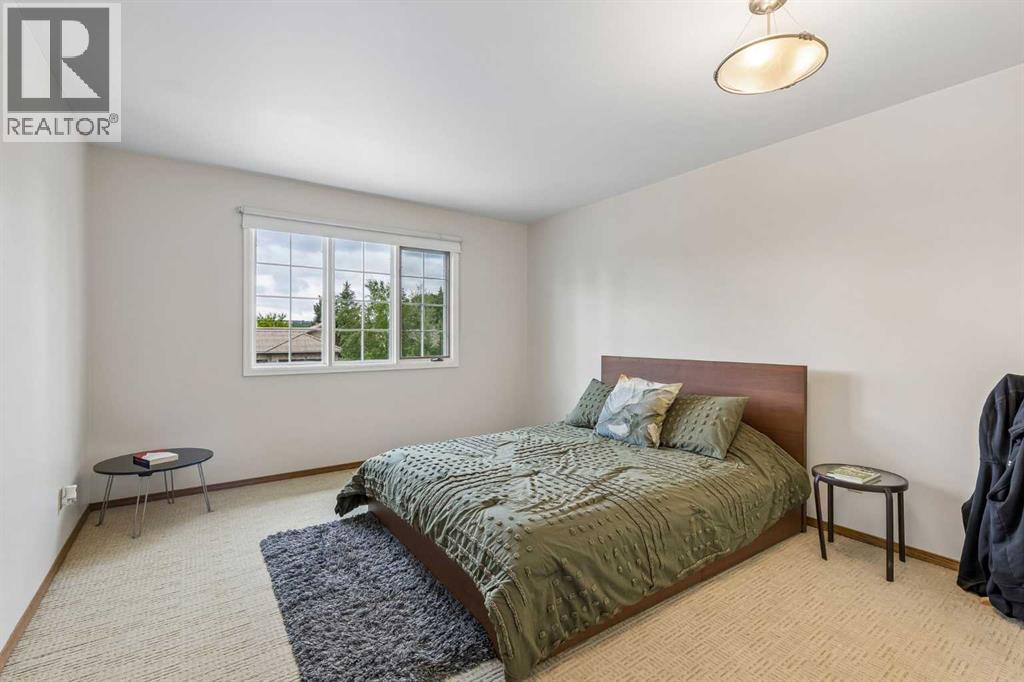 65 Woodpath Terrace Sw, Calgary, Alberta  T2W 5Z5 - Photo 29 - A2320982
