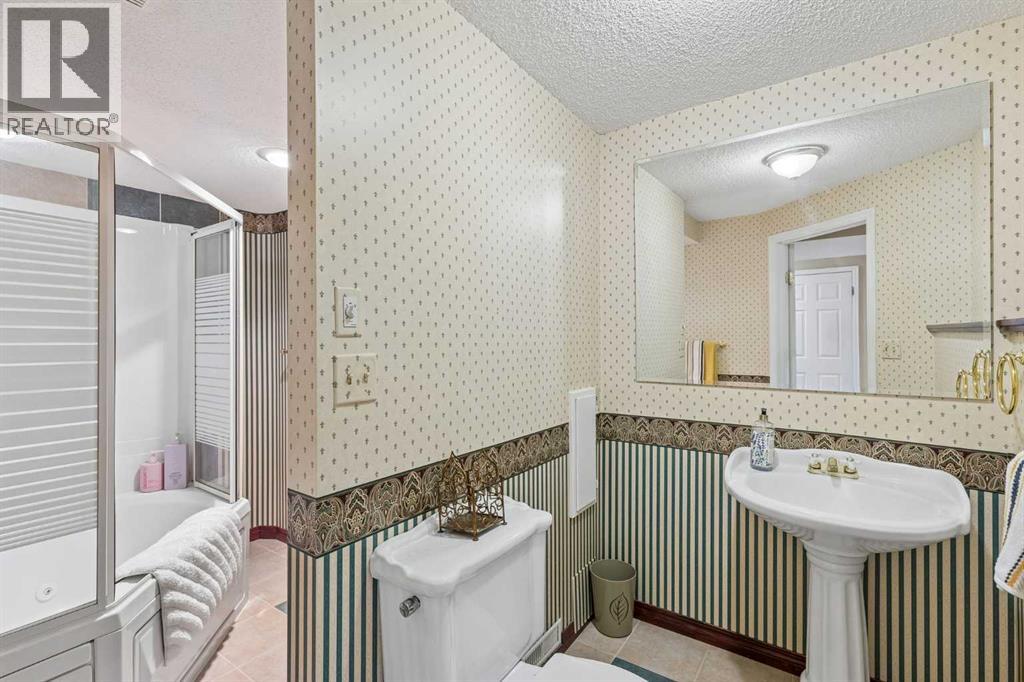 65 Woodpath Terrace Sw, Calgary, Alberta  T2W 5Z5 - Photo 39 - A2320982